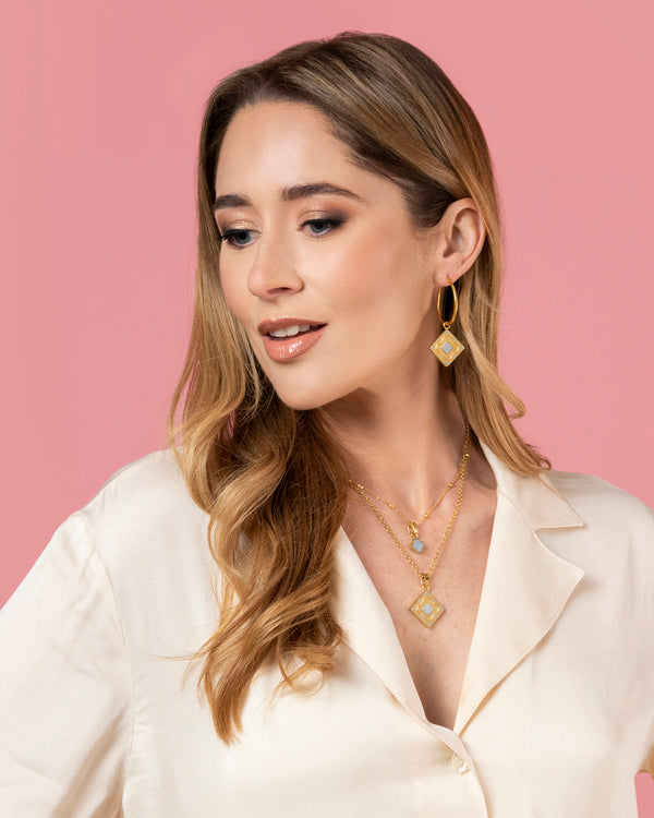 Carisma Rock Quartz Logo Stone Pendant Earring Set