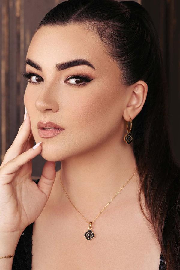 Carisma Rossi's Black Crystal Pendant Earring Set