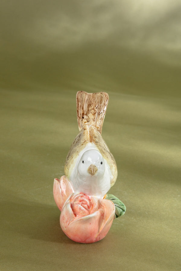Carraig Donn Bird Resting On A Pink Flower Ornament