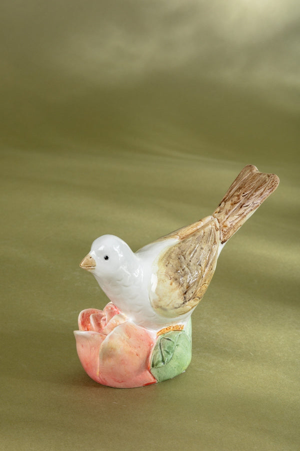 carraig donn Bird Resting on a Pink Flower Ornament