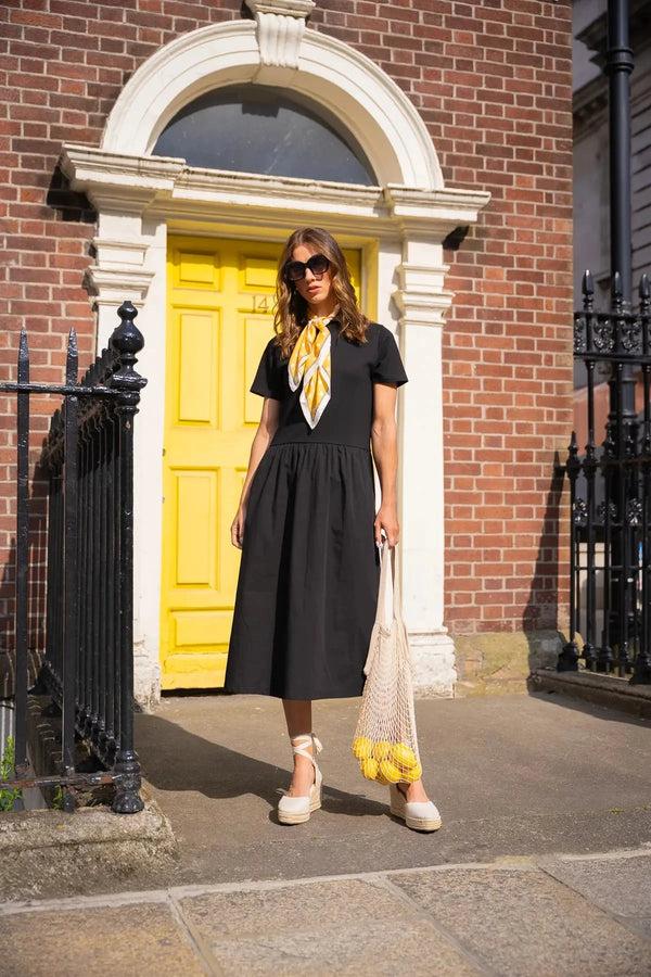 Carraig Donn Black Dress With Short Sleeves And Contrast Fabric Skirt