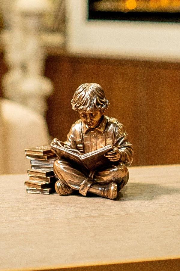 carraig donn Bronze Reading Time Boy