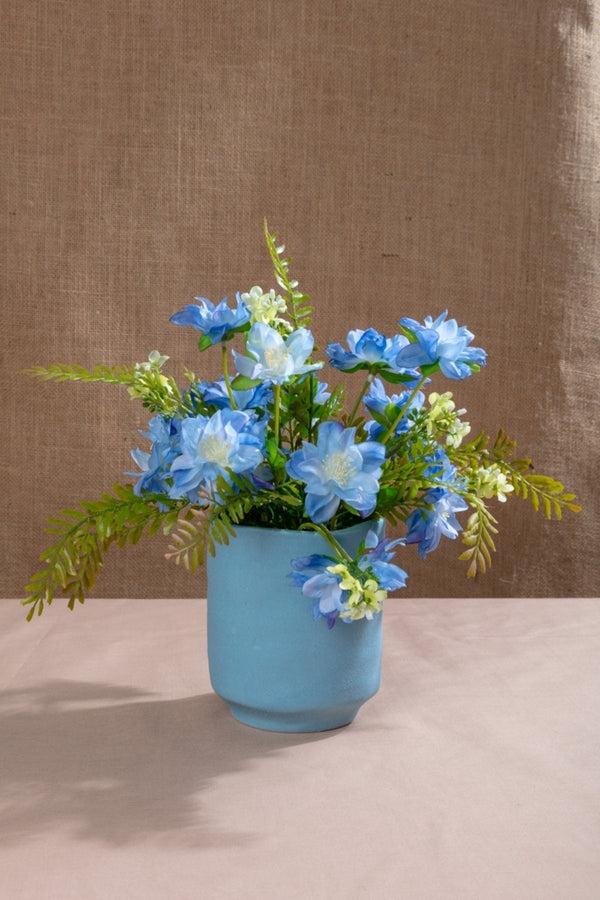 carraig donn Delphinium Posy in Blue Pottery Vase