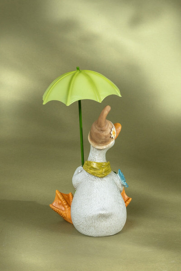 Carraig Donn Duck Sitting With Flowers & An Umbrella
