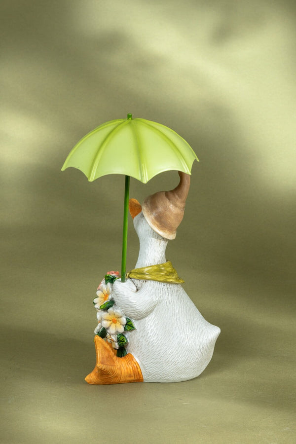 Carraig Donn Duck Sitting With Flowers & An Umbrella