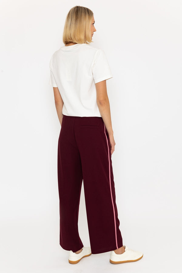 Carraig Donn Relaxed Fit Burgundy Trousers With Side Stripe