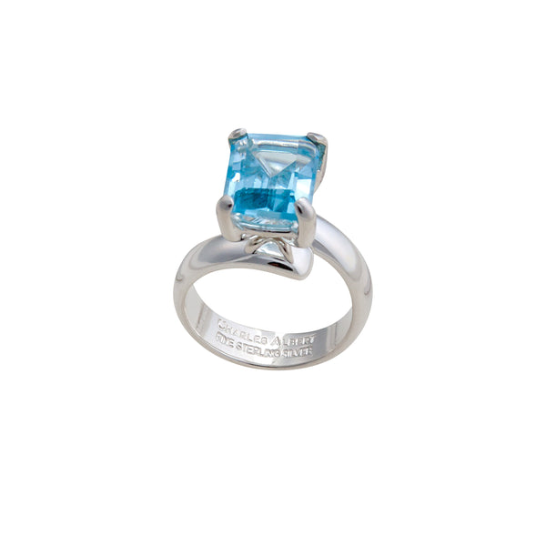 Charles Albert Sterling Silver Blue Topaz Petite Prong Set Adjustable Ring Sterling Silver Rings