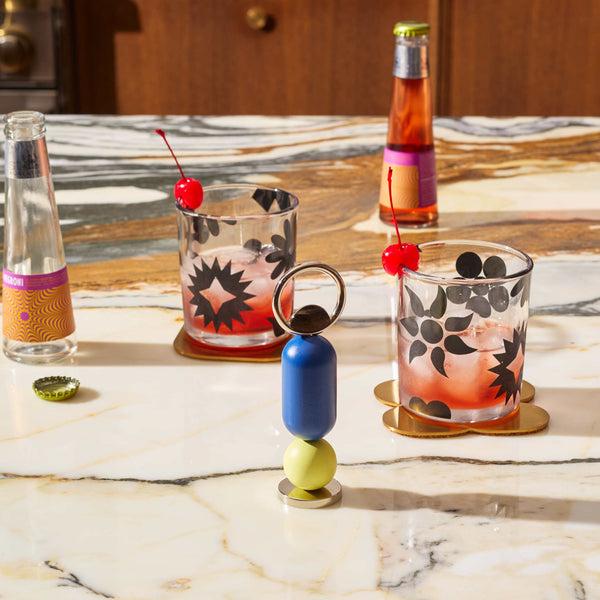 Charles And Marie ABACO - Blau-gelber Flaschenöffner - Joe Doucet | Areaware