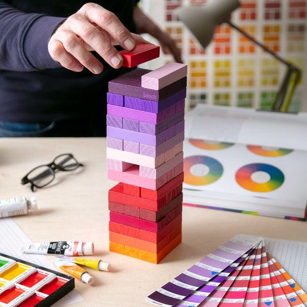 charles and marie GRADIENT TOWER WARM - Holz-Stapel-Spiel m. 48 Steinen - Pink-Rot-Orange | Block Design