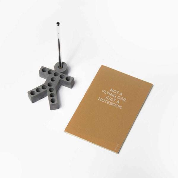 Charles And Marie NOT A FLYING CAR | Beiges Kraftpapier NOTIZBUCH | A5 Punktraster | Octàgon Design