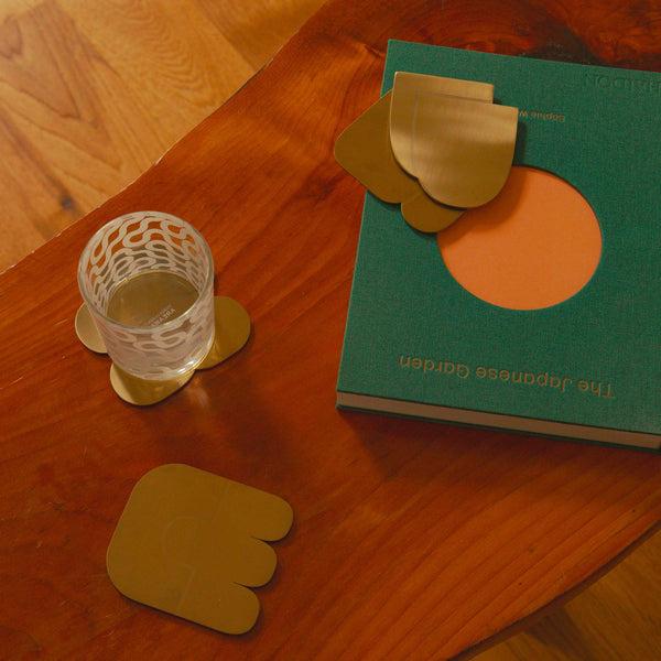 Charles And Marie TOGETHER COASTERS | 4er UNTERSETZER-Set | Edelstahl Messingfarbig | Dan Covert | Areaware
