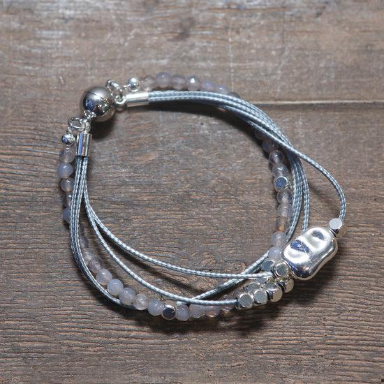 classic collection Layered rope bracelet with natural stone and silver charms