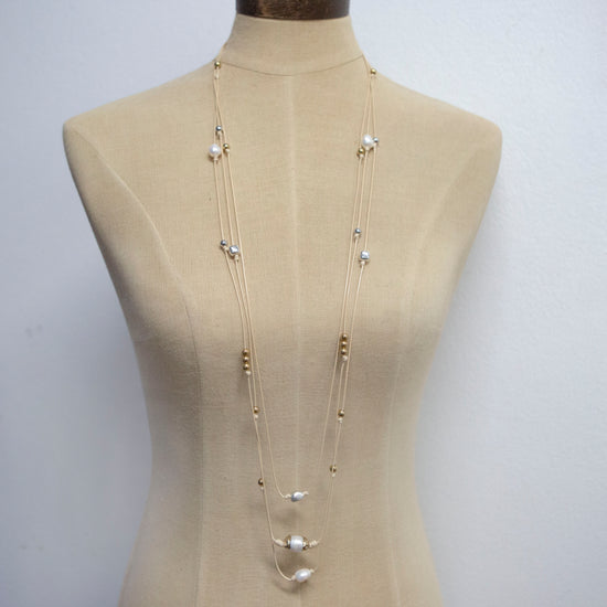 classic collection Natural leather long necklace with gold and silver balls