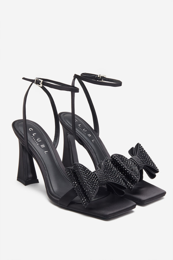 Club L Headlines Black Ankle Strap Heeled Sandals With Diamante Bows