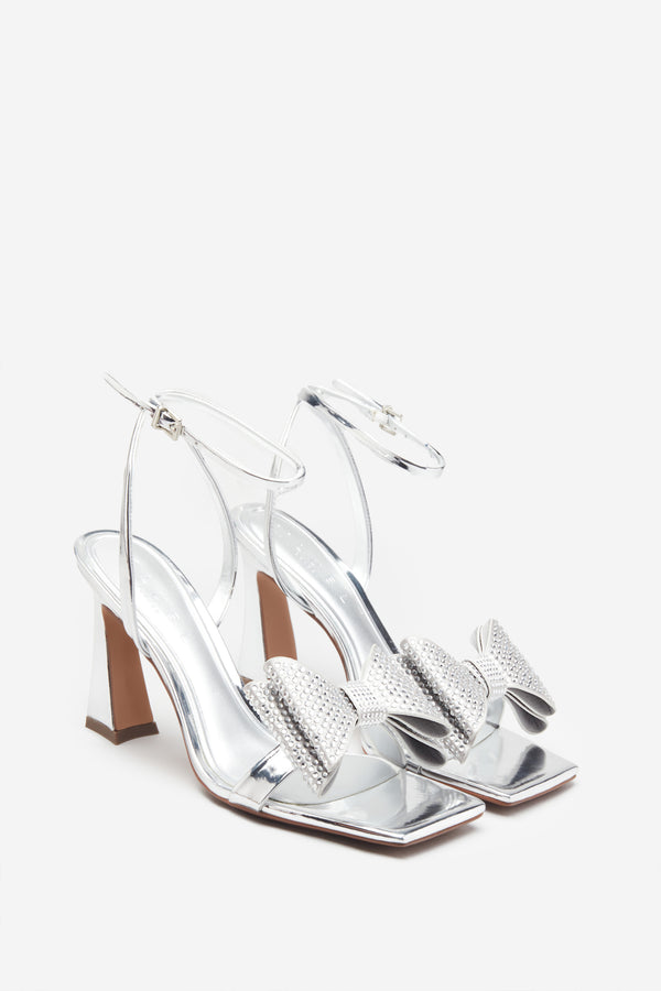 Club L Headlines Silver Ankle Strap Heeled Sandals With Diamante Bows