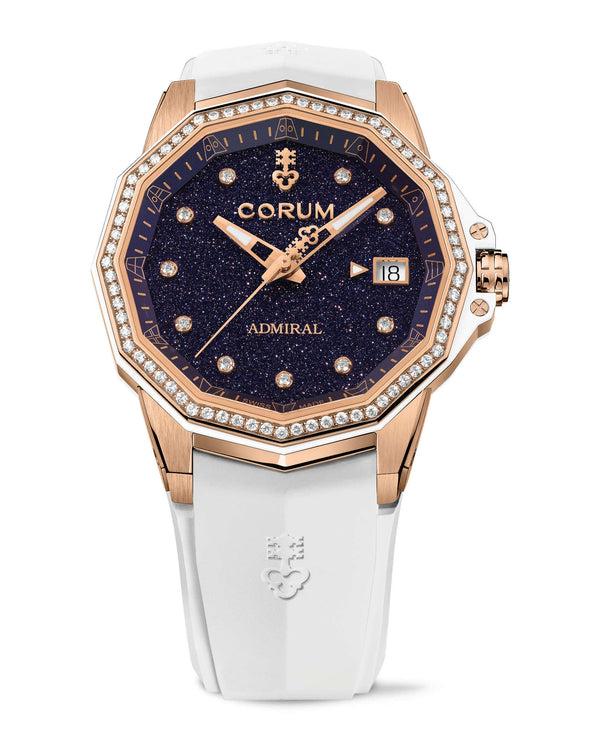 cortina Corum Admiral 38 Automatic Dark Blue Adventurine Dial With 10 Diamonds 18K Rose Gold Case 72 Round Diamonds On Bezel White Rubber Strap 18K Rose Gold Triple Folding Clasp