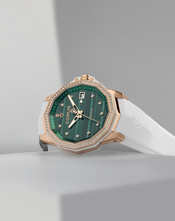 Cortina Corum Admiral 38 Automatic Green Malachite Dial With 10 Diamonds 18K Rose Gold Case 72 Round Diamonds On Bezel White Rubber Strap 18K Rose Gold Triple Folding Clasp