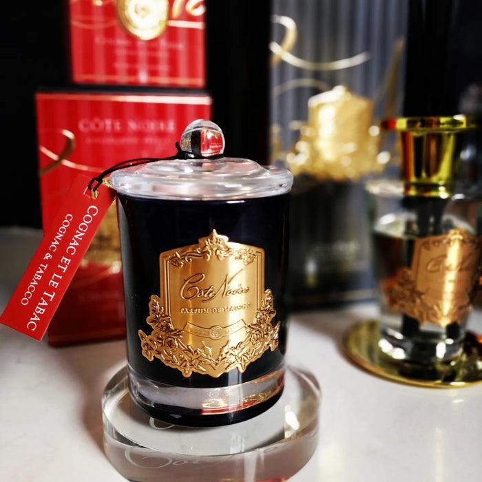 Côte Noire Cote Noire Candles - Dark Vessel With Gold Badge - Cognac & Tobacco