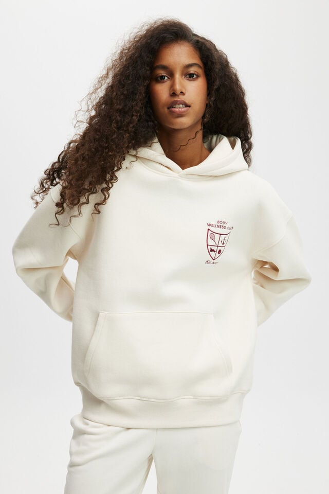 cotton on Plush Premium Graphic Hoodie coconut milk/heritage wellness club
