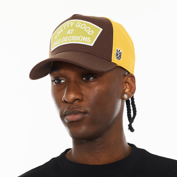 Cult Of Individuality Cult's Logo Mesh Back Trucker Hat "Good At Bad Decisions" In Chocolate Hats