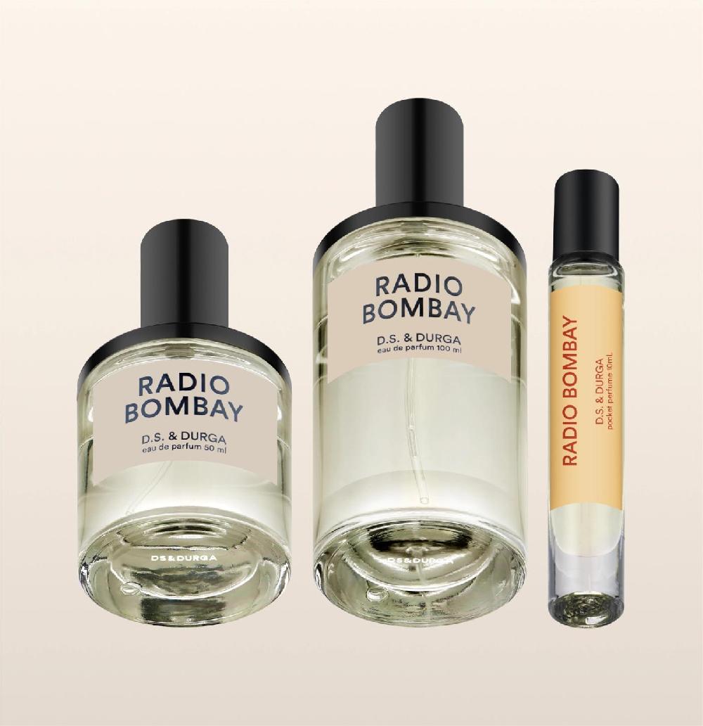 d.s. & durga Transistor radio hewn of sandalwood radiates ragas in the Bandra heat. Hot copper tubes warm the soft wood releasing blooms of musk cream peach ambrette coco cedar distillates
