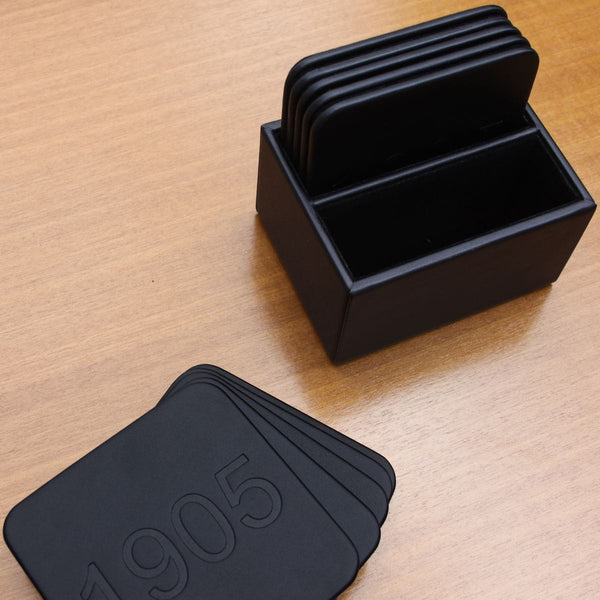 Dacasso Black Leatherette 10 Square Coaster Set W/ Holder