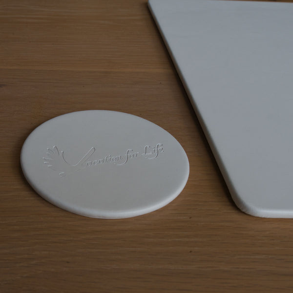 Dacasso White Leatherette Coaster Round