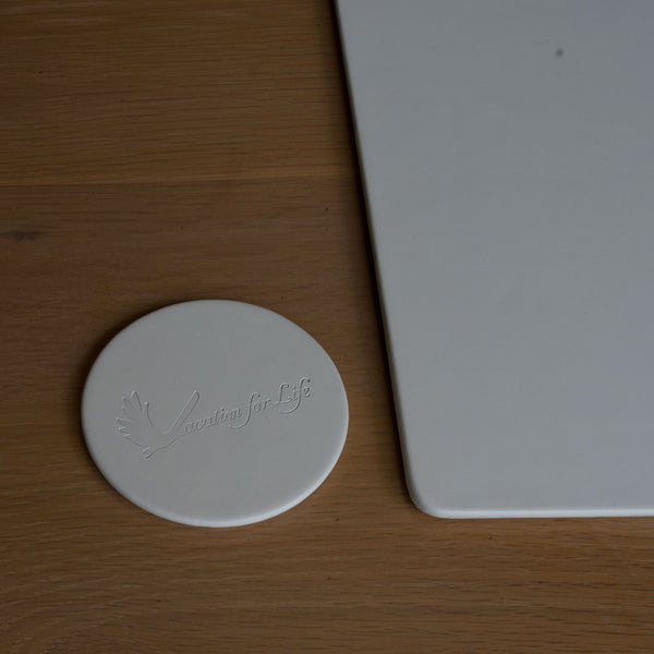 Dacasso White Leatherette Coaster Round