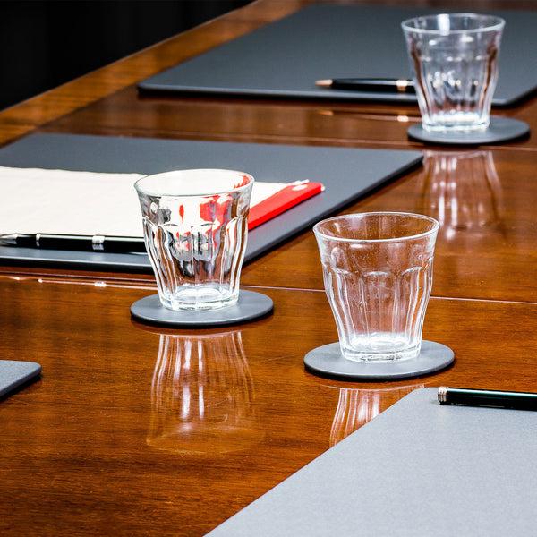 Dacasso Gray Leatherette 4 Round Coaster Set W/ Holder