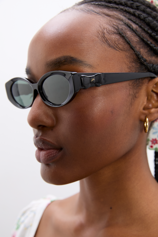 Damson Madder Catty Oval Sunglasses With Bow Detail In Black