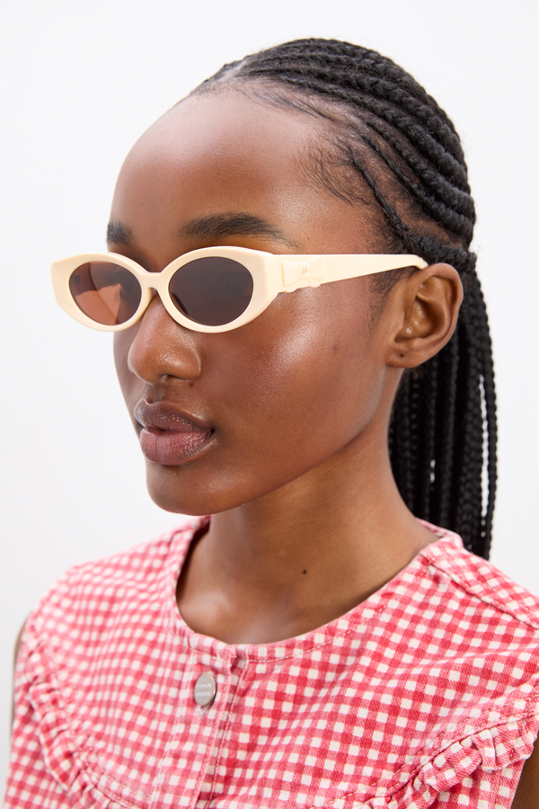 damson madder catty oval sunglasses with bow detail in bone