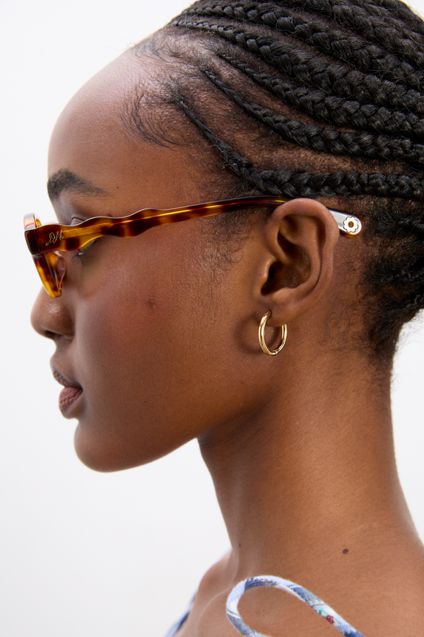 Damson Madder Slim Oval Sunglasses With Wavy Temple In Tort