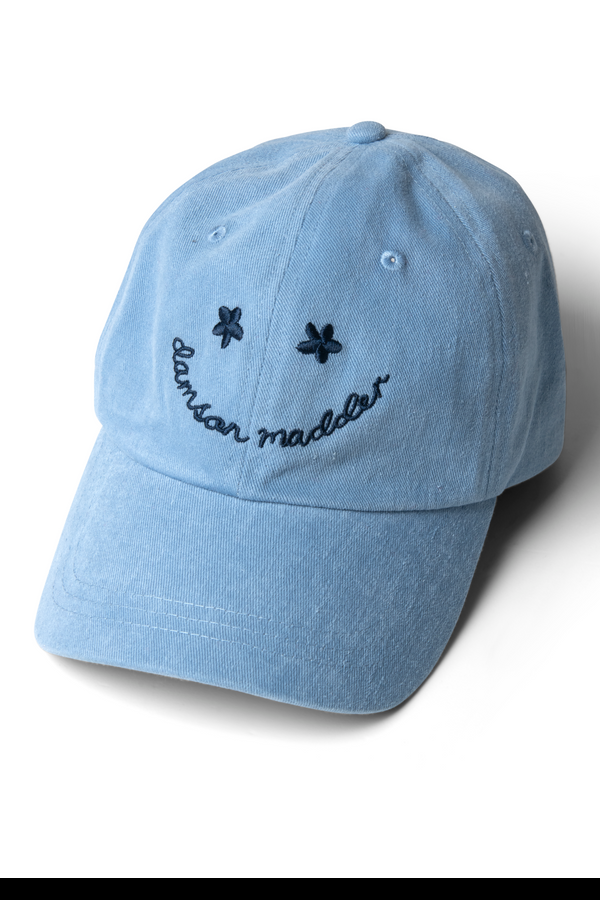 damson madder washed smiley cap in blue with navy embroidery