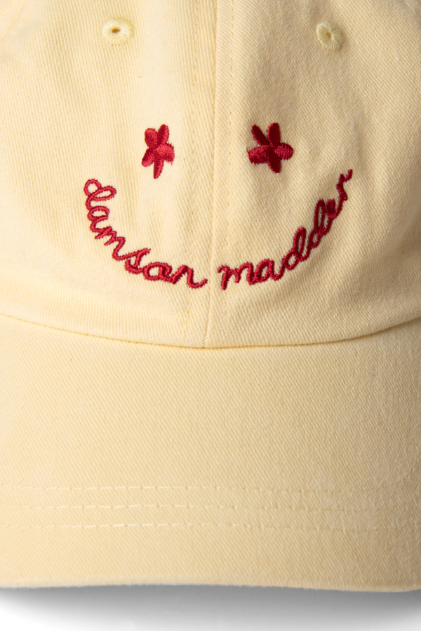 Damson Madder Washed Smiley Cap In Butter With Red Embroidery