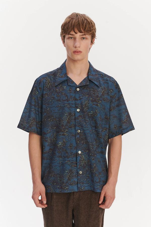 Delikatessen Short Sleeve Cuban Collar Shirt In A Blue Printed Palm Design Italian Cotton And Lyocell