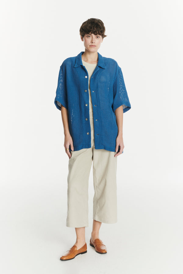 Delikatessen Short Sleeve Unisex Cuban Collar Shirt In A Soft Cornflower Blue Open Weave Portuguese Cotton