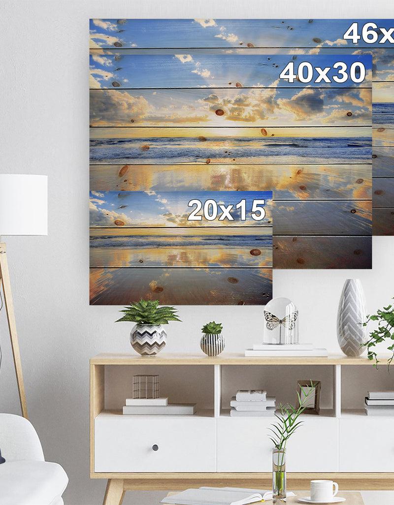 Designq Blue Sky And Clouds Mirrored In Sea - Seashore Print On Natural Pine Wood