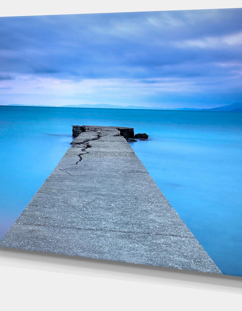 Designq Broken Concrete Jetty - Seascape Photo Canvas Print