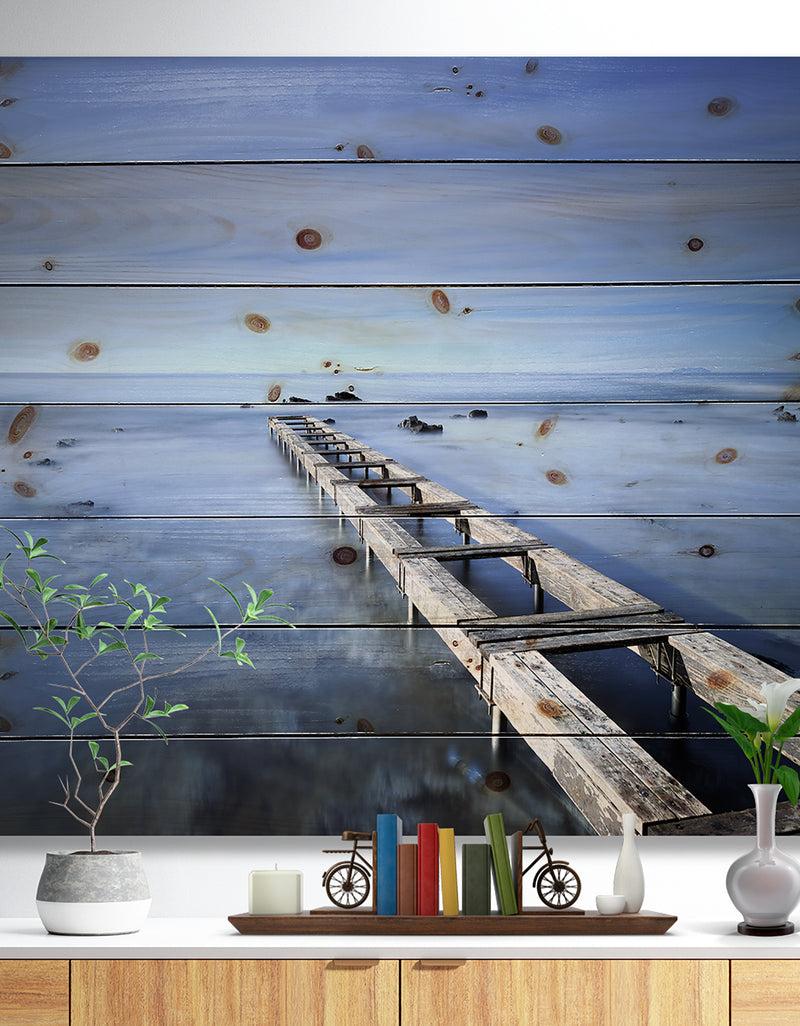 designq Dark Blue Sky and Large Pier - Seascape Print on Natural Pine Wood