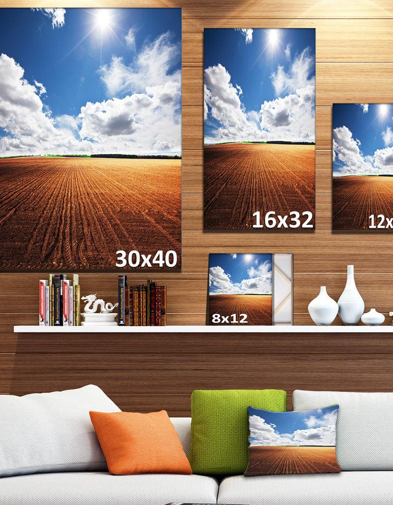 Designq Expansive Field Under White Clouds - Modern Landscape Wall Art Canvas