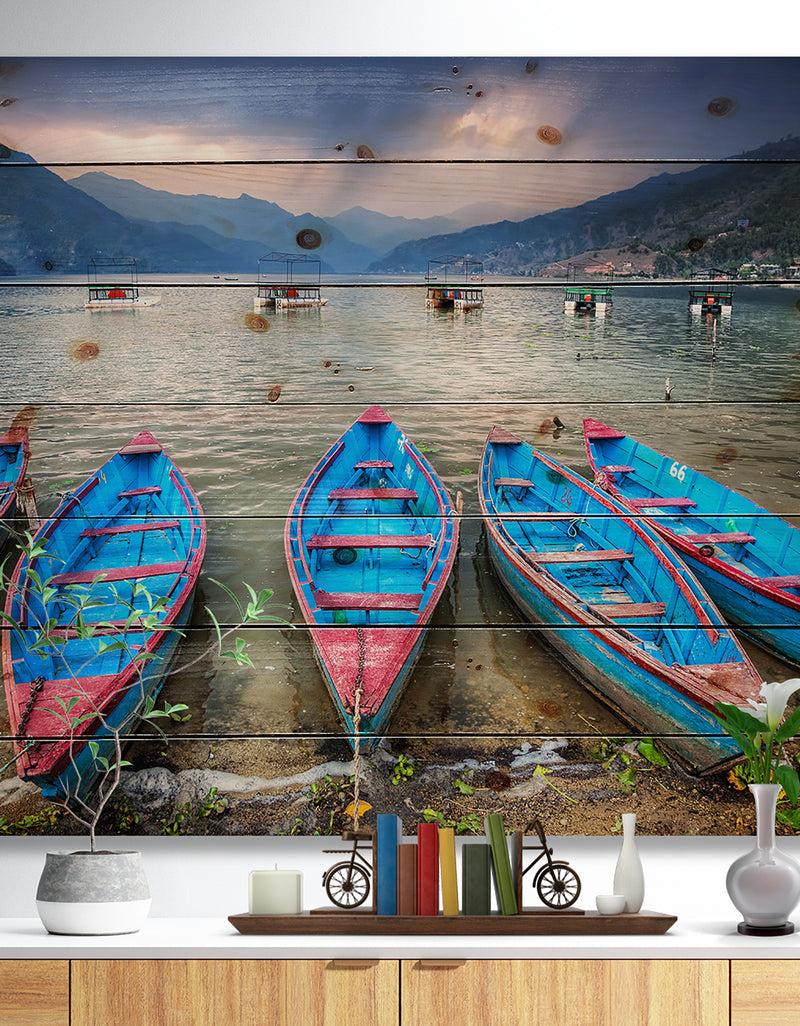 designq Row of Blue Boats in Pokhara Lake - Boat Print on Natural Pine Wood