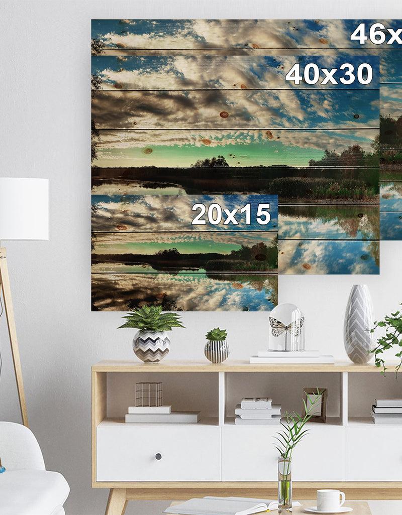 Designq Sky Clouds Mirrored In River Panorama - Landscape Print On Natural Pine Wood