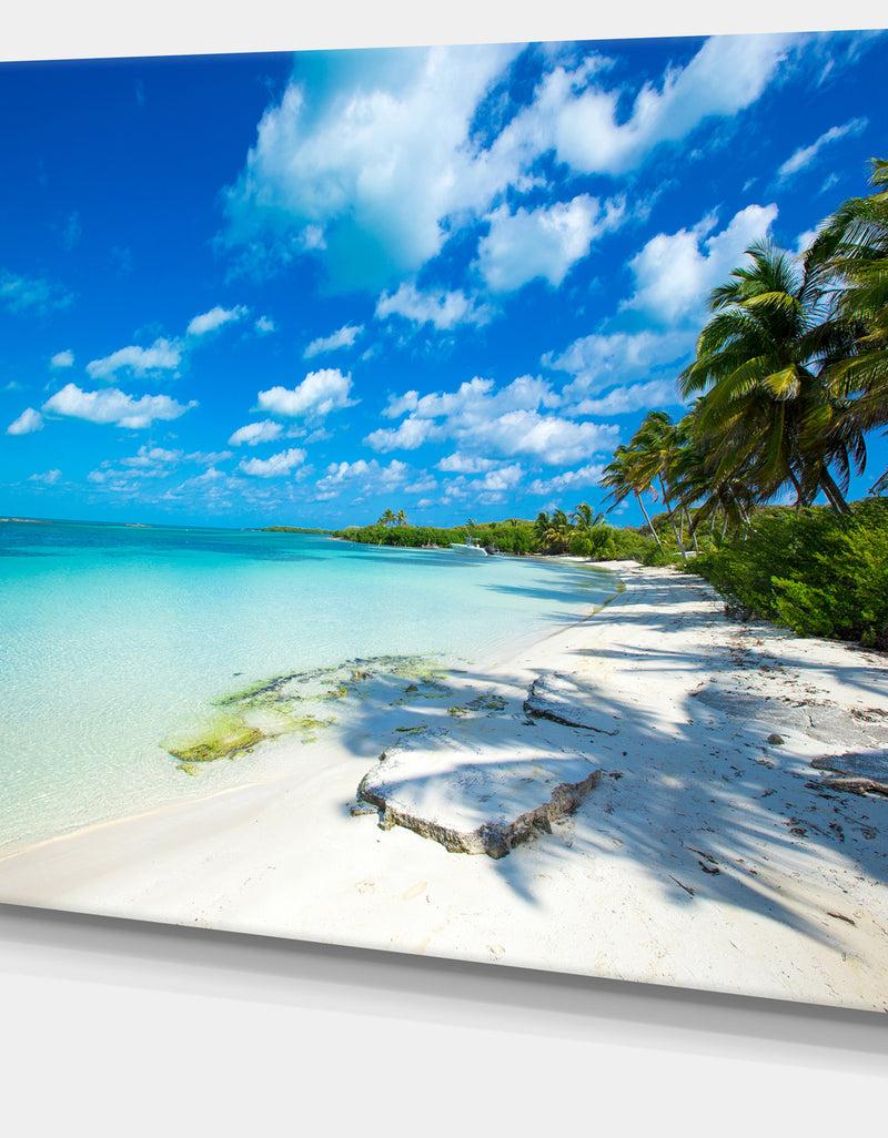 Designq Tropical Beach With Palm Shadows - Large Seashore Canvas Print