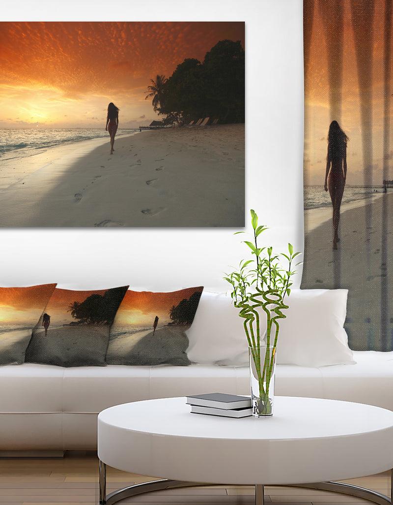designq Woman Walking on Beach - Seashore Photo Canvas Art Print