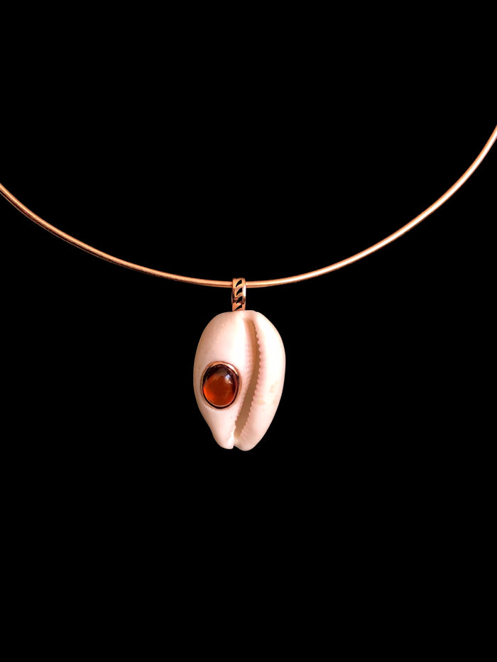 dezso by sara beltran Cowry Shell with Cabochon Garnet