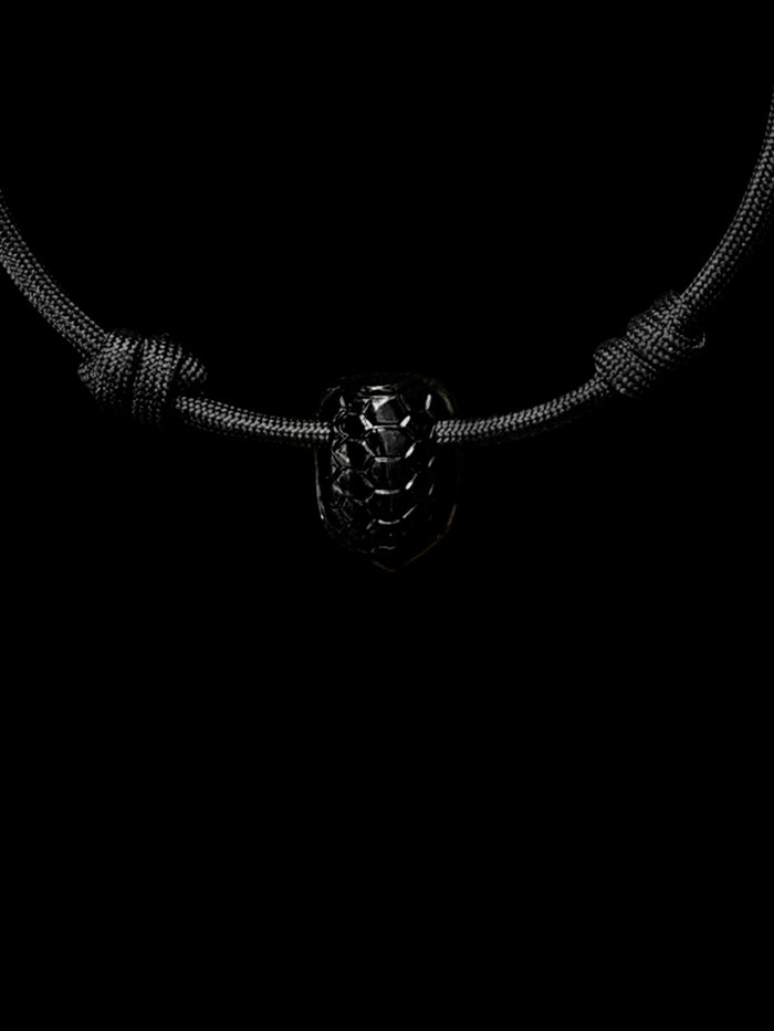 Dezso By Sara Beltran Onyx Carved Turtle Bead On Black Paracord