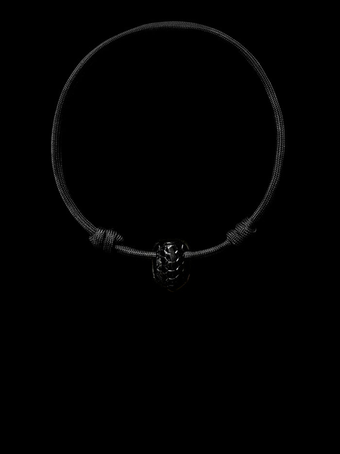 dezso by sara beltran Onyx Carved Turtle Bead on Black Paracord