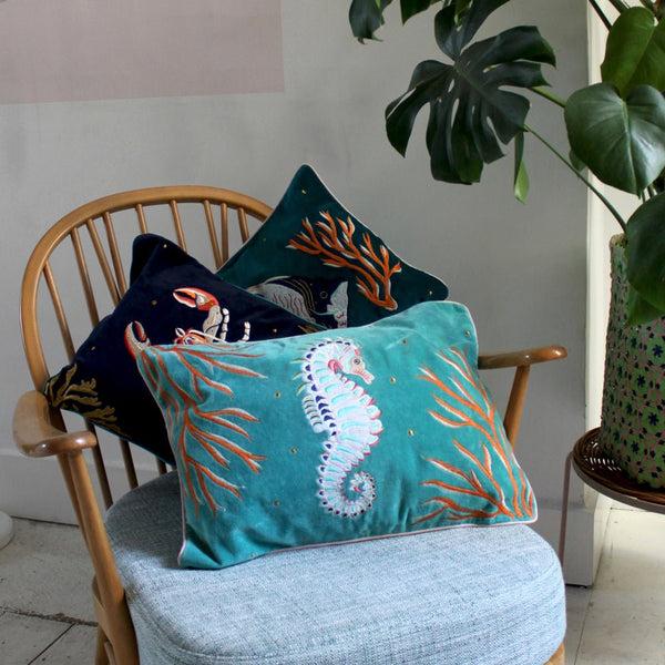 disaster designs Coral Velvet Seahorse Cushion