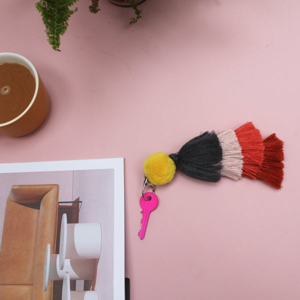 Disaster Designs Pompom Keychain