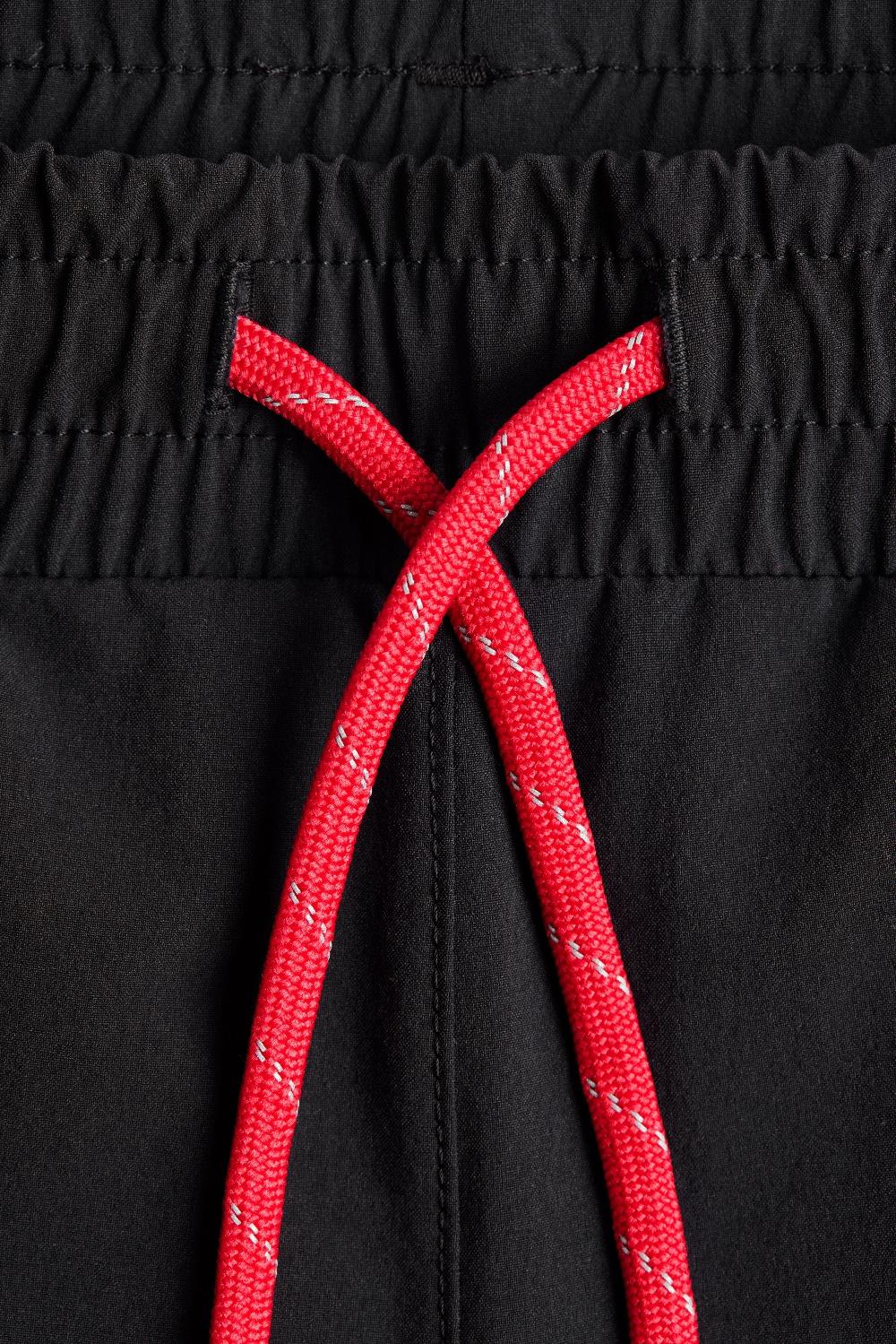 District Vision Lightweight DWR Track Pant Black Symbol